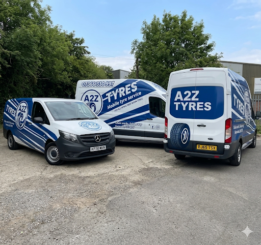 Three A2Z Tyres vans β mobile tyre service fleet parked together