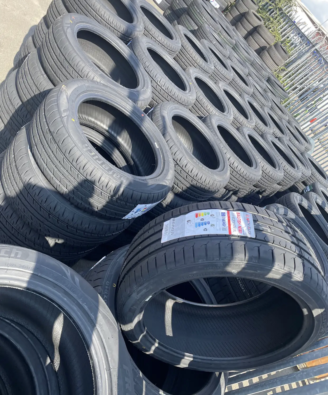 Racks of brand new car tyres ready to be fitted