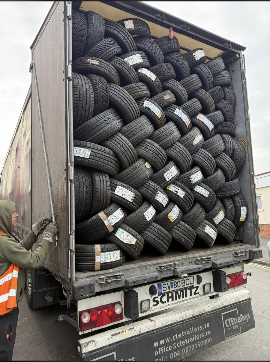 Lorry trailer loaded with part worn tyres ready for recycling