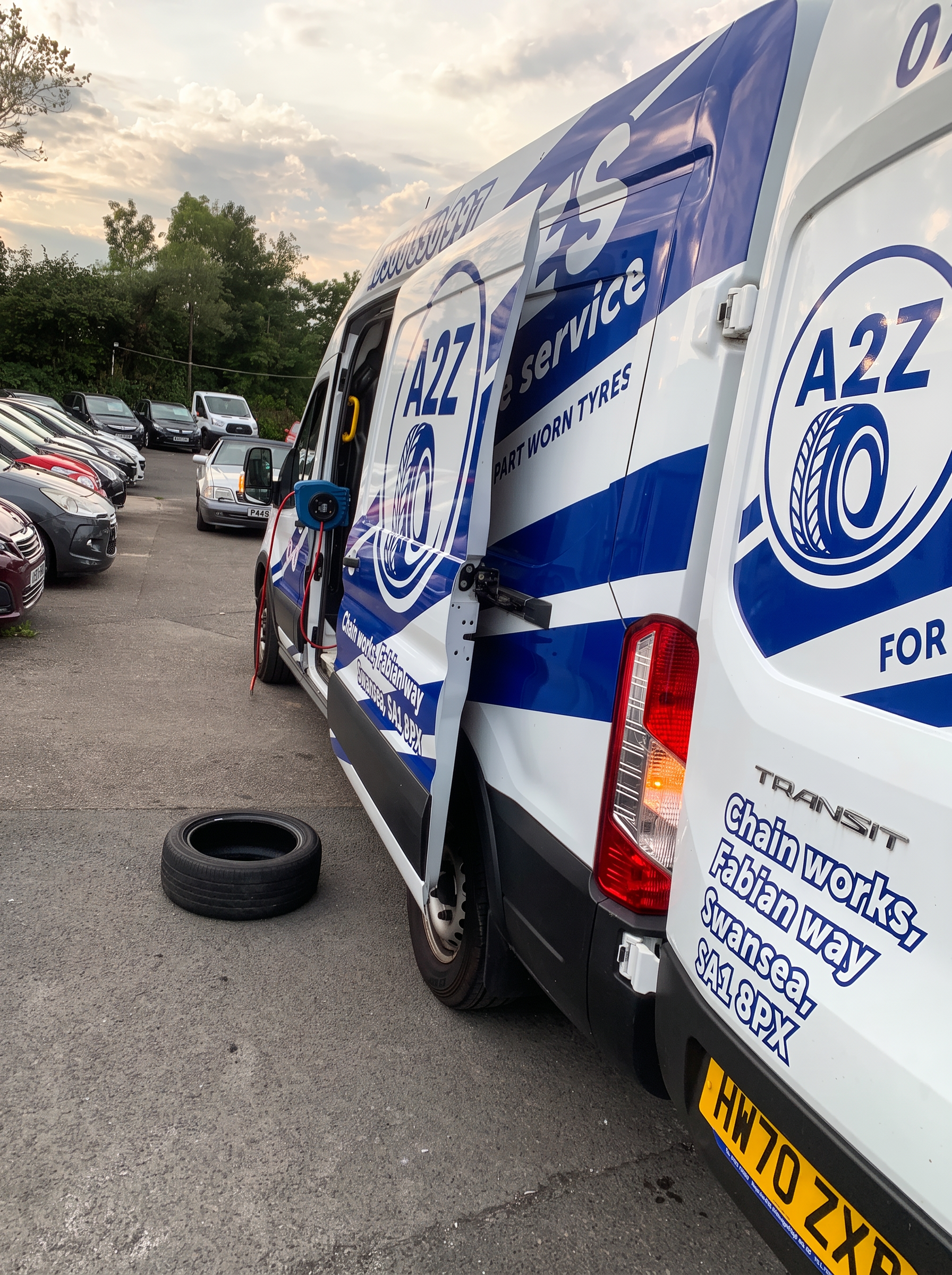 A2Z Mobile Tyre Service van with doors open at a tyre fitting job